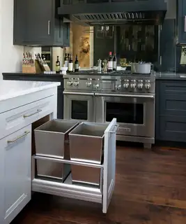 Rev-A-Shelf pull-out waste and recycling organizer installed in cabinetry